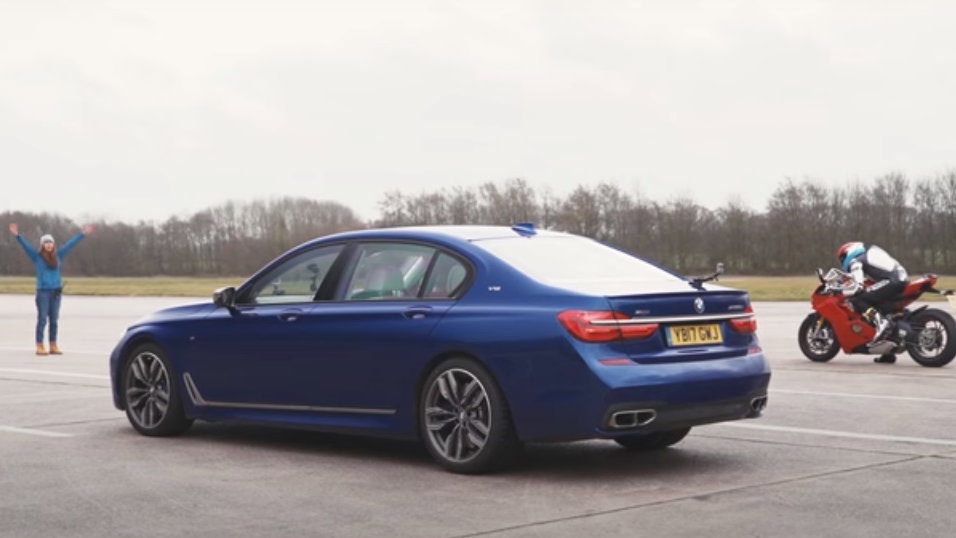 Ducati motorcycle racing BMW car